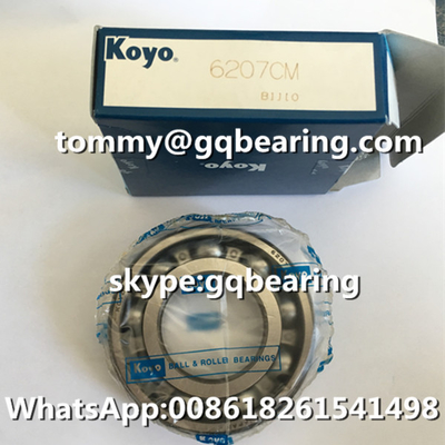 Gcr15 Çelik Malzemesi Japonya Orijinal KOYO 6207 6207CM Tek Sıralı Derin Çukurlu Top Taşıyıcısı